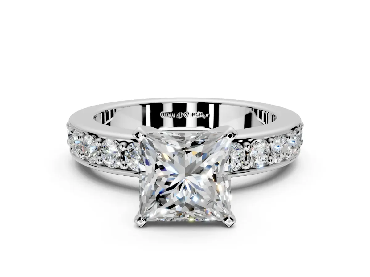 Solitaire Engagement Ring Setting for Princess Cut Center with Channel-Set Accents and Prong Head in Platinum