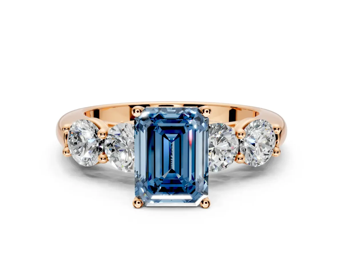 5 Stone Engagement Ring Setting for Fancy Blue Emerald Cut Center with Graduated Accents and Prong Head in Rose Gold
