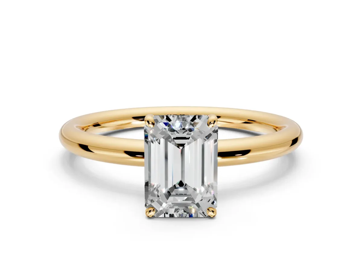 Low-Set Solitaire Engagement Ring Setting for Emerald Cut Center with Thin Plain Band and Prong Head in Yellow Gold