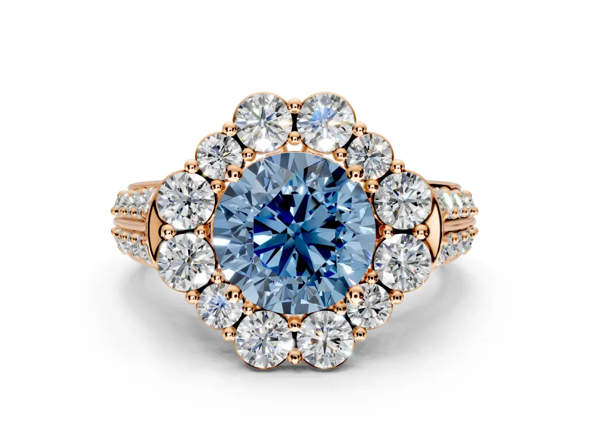 Large Accent Halo Engagement Ring Setting for Fancy Blue Round Cut Center with Pave Split Shank and Prong Head in Rose Gold