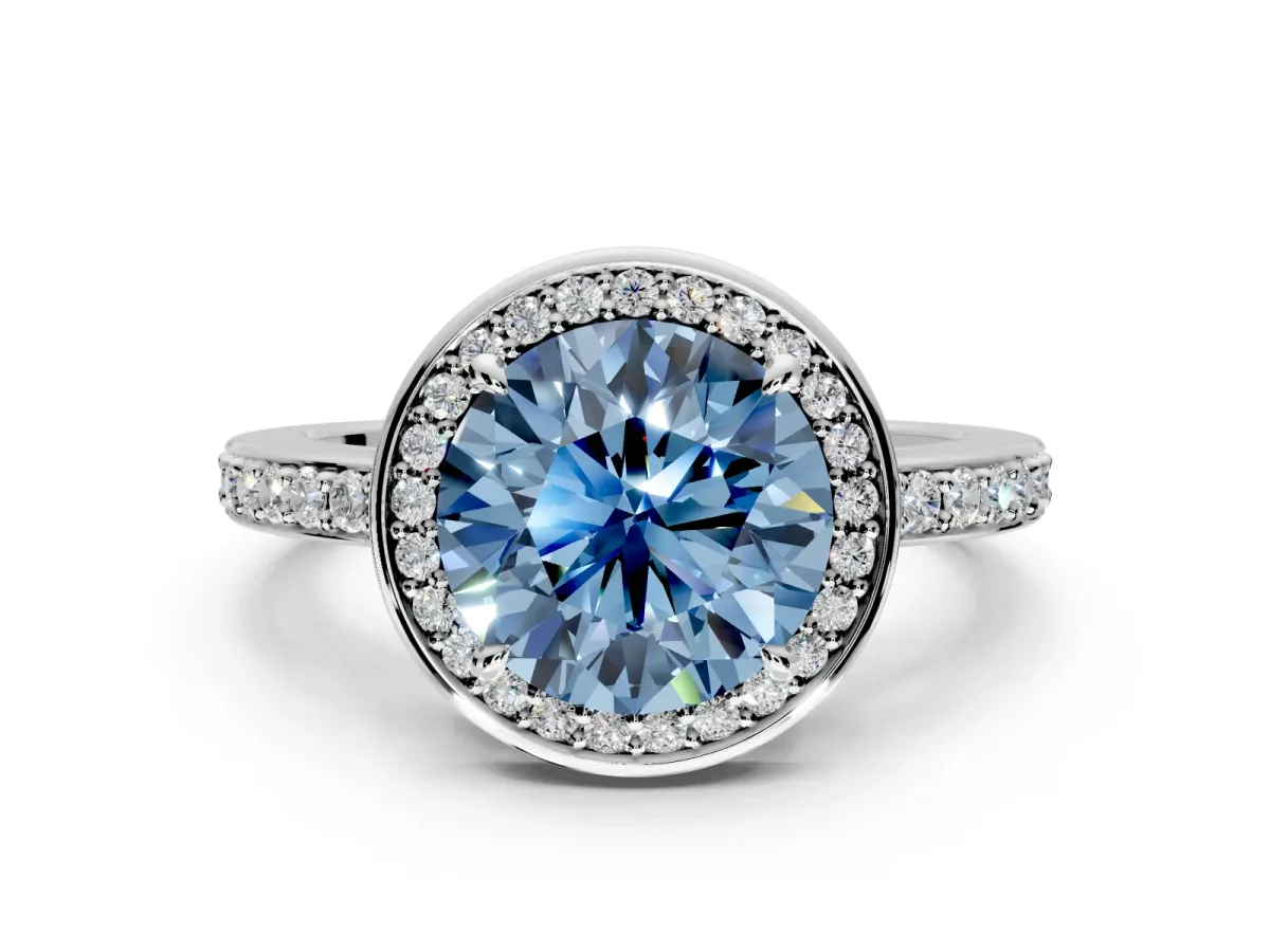 Halo Engagement Ring Setting for Fancy Blue Round Cut Center with Metal-Rimmed Halo, Pave Band and Prong Head in Sterling Silver