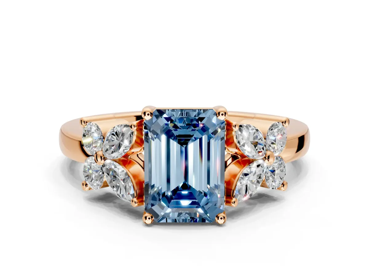 Floral Engagement Ring Setting for Fancy Blue Emerald Cut Center with Marquise Cluster Shoulders and Prong Head in Rose Gold
