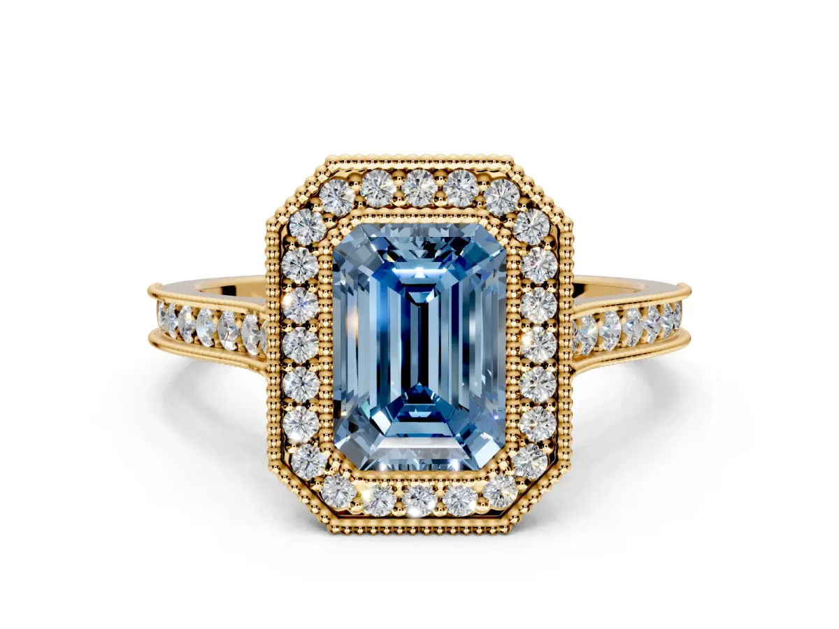 Halo Engagement Ring Setting for Fancy Blue Emerald Cut Center with Milgrain Pave Band and Bezel Head in Yellow Gold