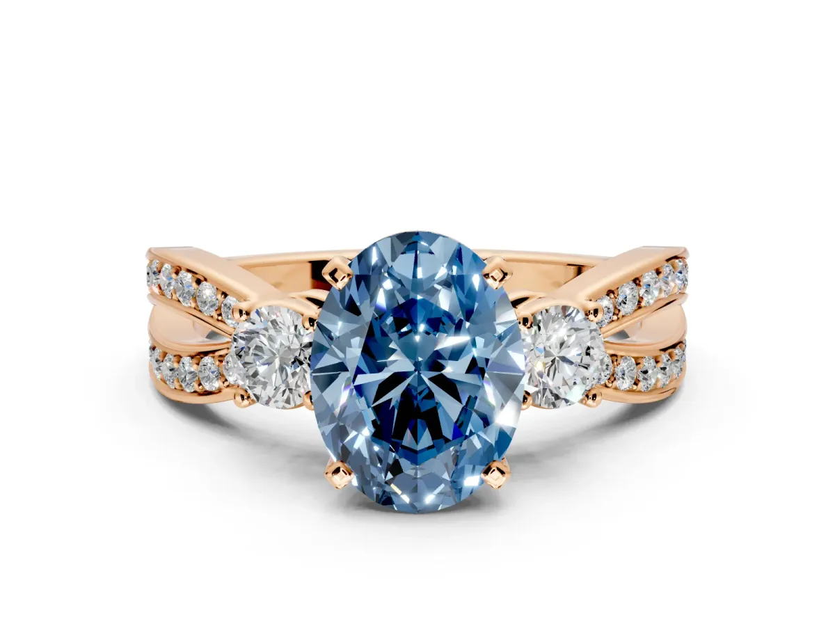 3 Stone Engagement Ring Setting for Fancy Blue Oval Center with Pave Twist Band and Prong Head in Rose Gold