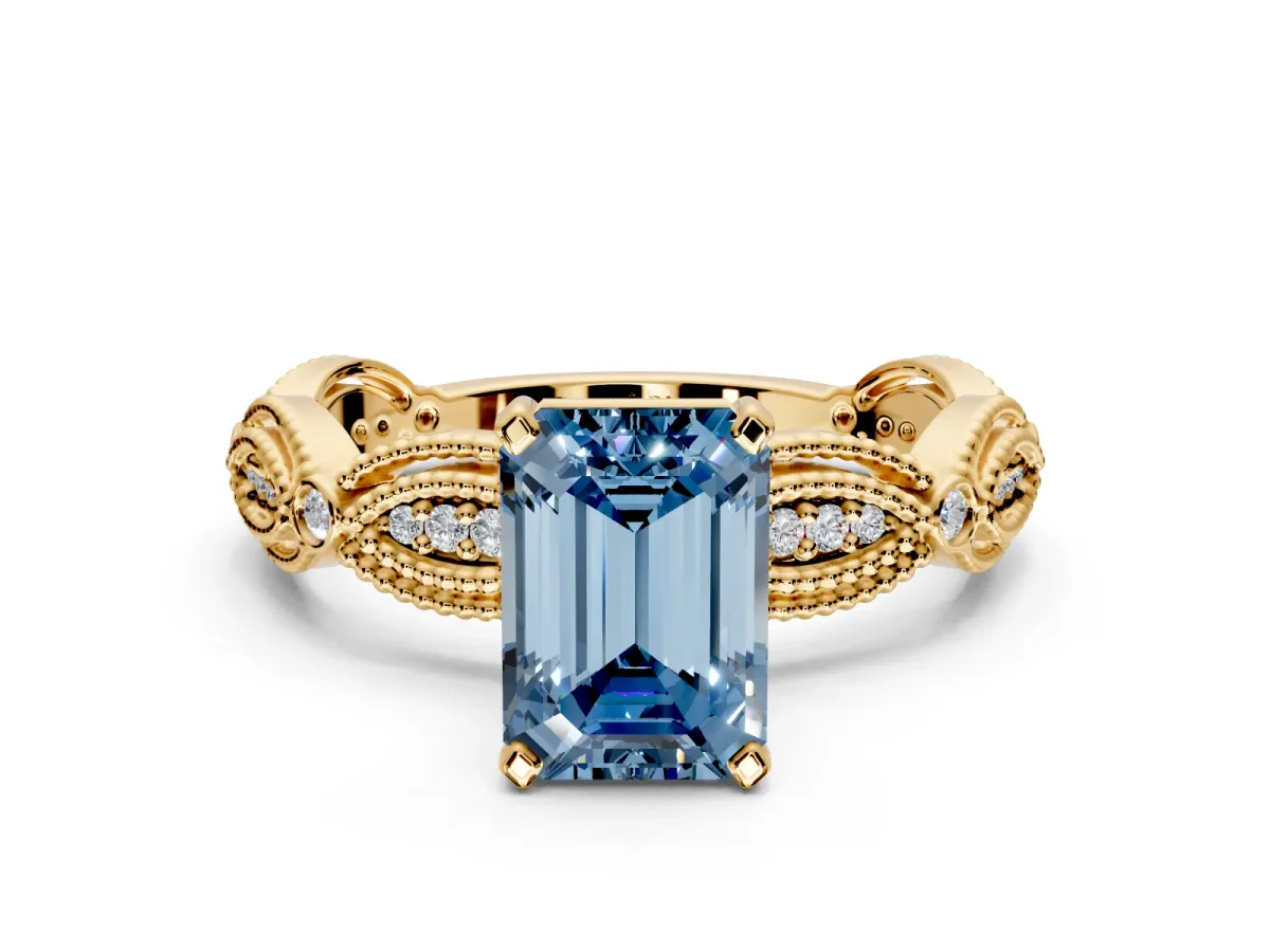 Solitaire Engagement Ring Setting for Fancy Blue Emerald Cut Center with Marquise Panel Band and Prong Head in Yellow Gold
