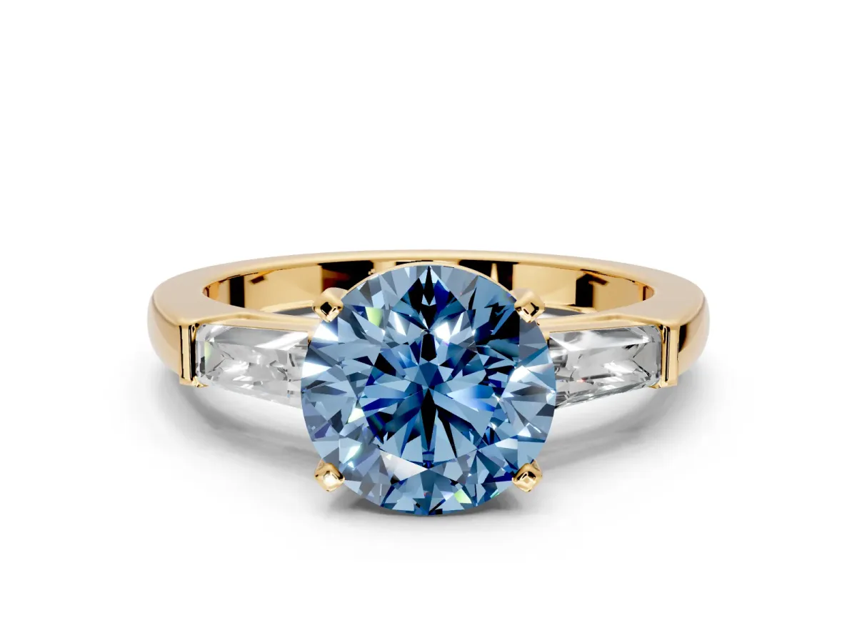 3 Stone Engagement Ring Setting for Fancy Blue Round Cut Center with Tapered Baguettes, Plain Band and Prong Head in Yellow Gold