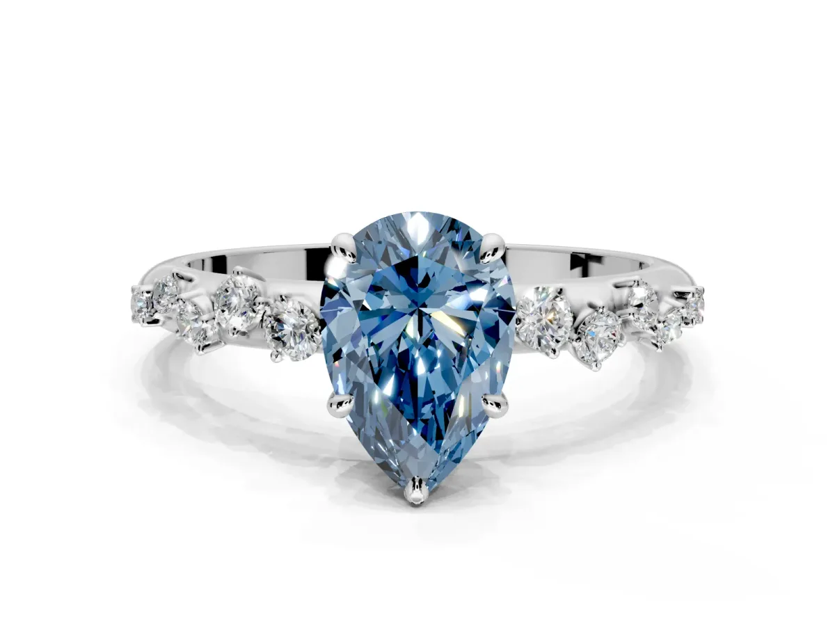Cluster Engagement Ring Setting for Fancy Blue Pear-Shaped Center with Round Cut Accent Band and Prong Head in Platinum