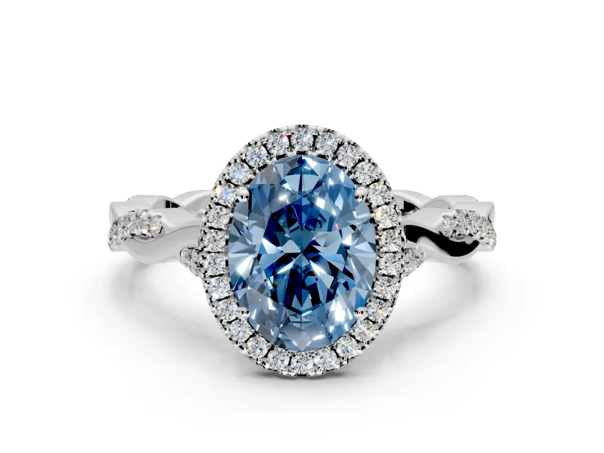 Halo Engagement Ring Setting for Fancy Blue Oval Center with Twist Band and Prong Head in White Gold