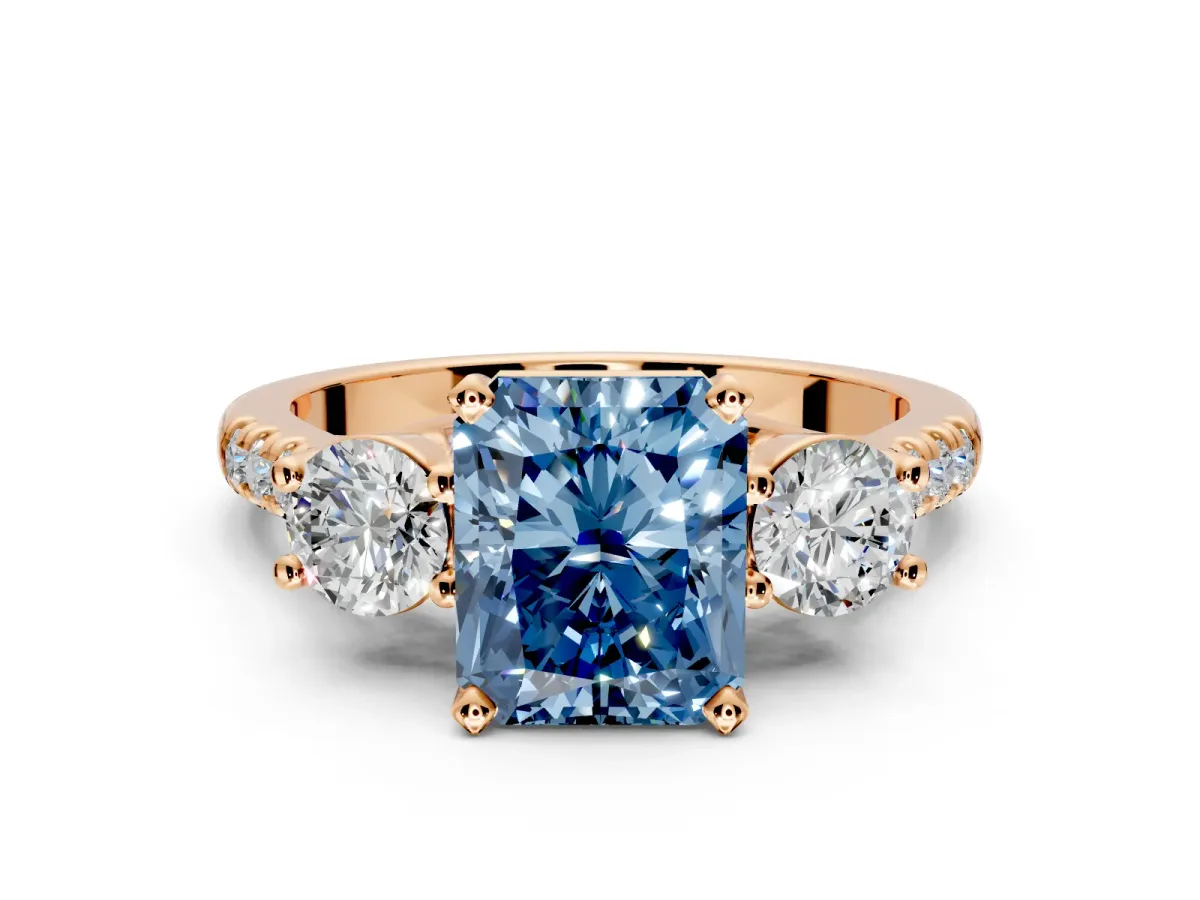 3 Stone Engagement Ring Setting for Fancy Blue Radiant Cut Center with Crossover Basket, Pave Band and Prong Head in Rose Gold