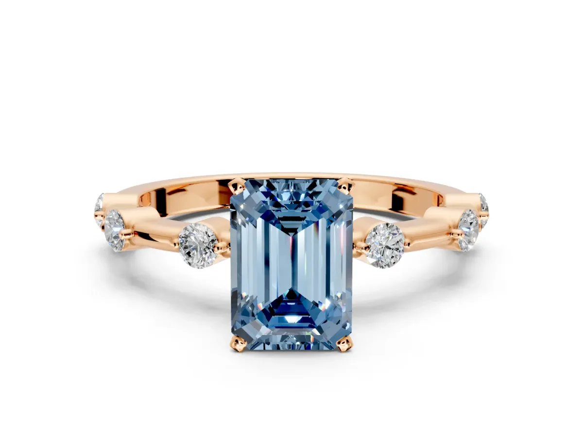 Solitaire Engagement Ring Setting for Fancy Blue Emerald Cut Center with Bezel Station Band and Prong Head in Rose Gold