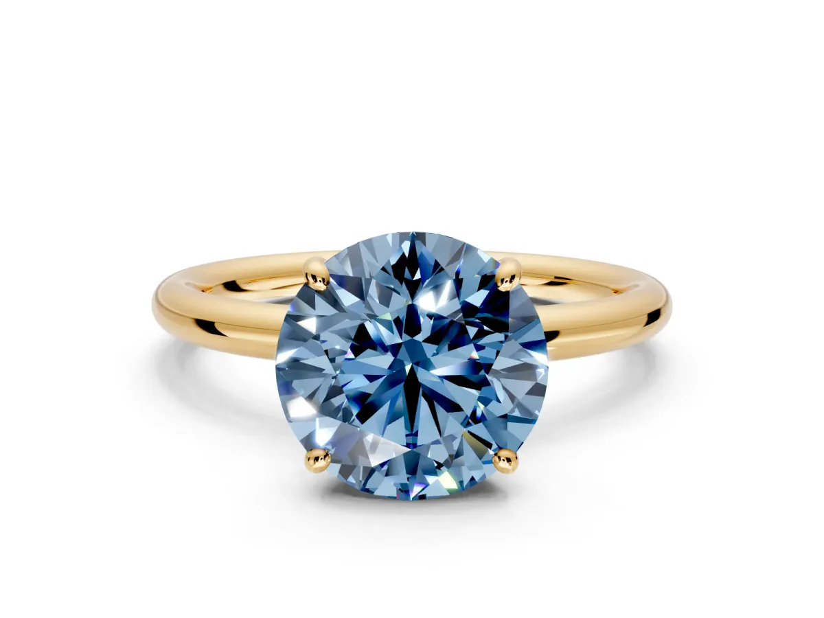 Low-Set Solitaire Engagement Ring Setting for Fancy Blue Round Cut Center with Thin Plain Band and Prong Head in Yellow Gold