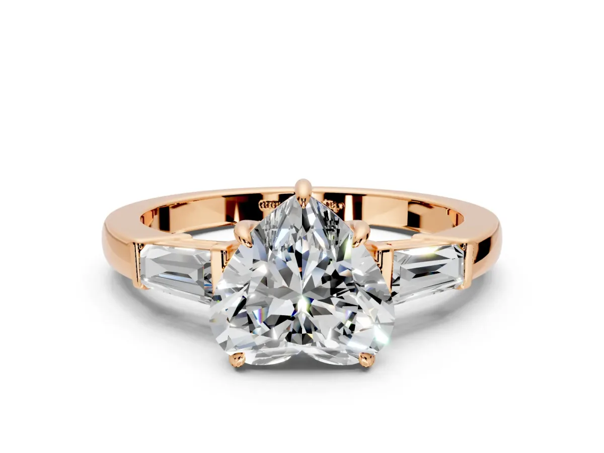 3 Stone Engagement Ring Setting for Heart-Shaped Center with Baguette Accents and Prong Head in Rose Gold