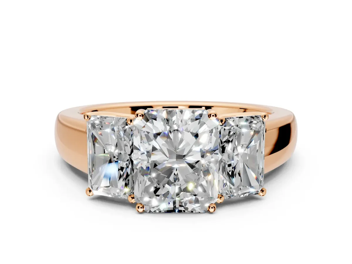 3 Stone Engagement Ring Setting for Radiant Cut Center with Raised Basket Heads and Prong Head in Rose Gold