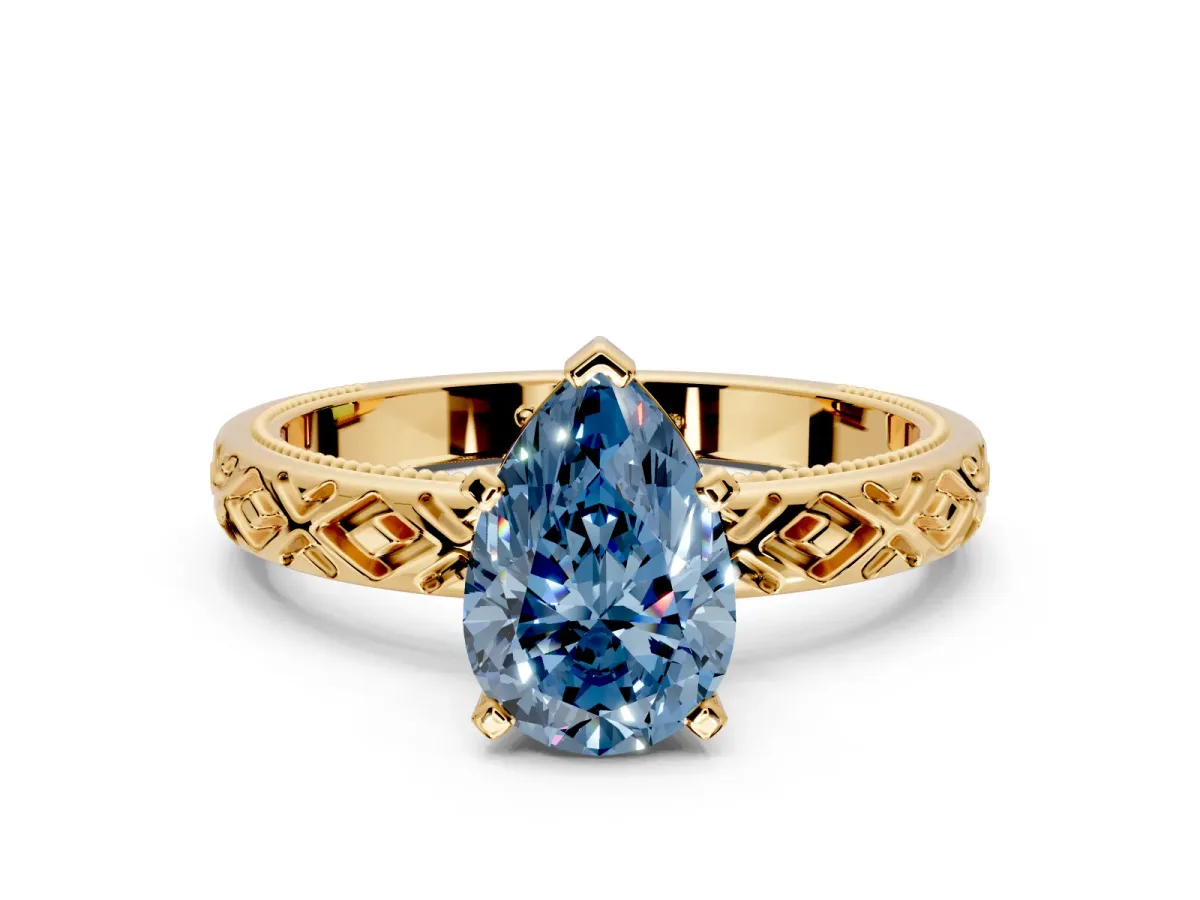 Solitaire Engagement Ring Setting for Fancy Blue Pear-Shaped Center with Milgrain X Pattern Band and Prong Head in Yellow Gold