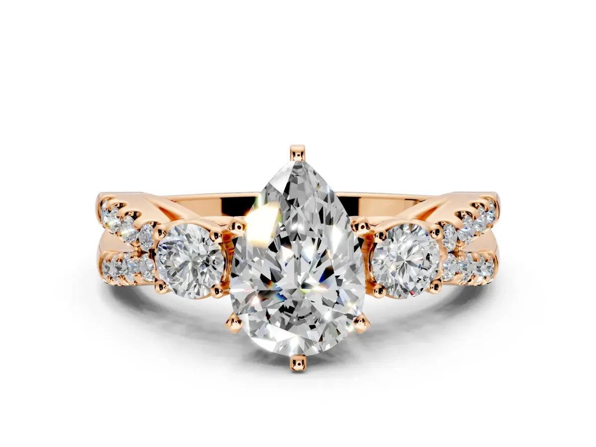 3 Stone Engagement Ring Setting for Pear-Shaped Center with Pave Split Shank and Prong Head in Rose Gold