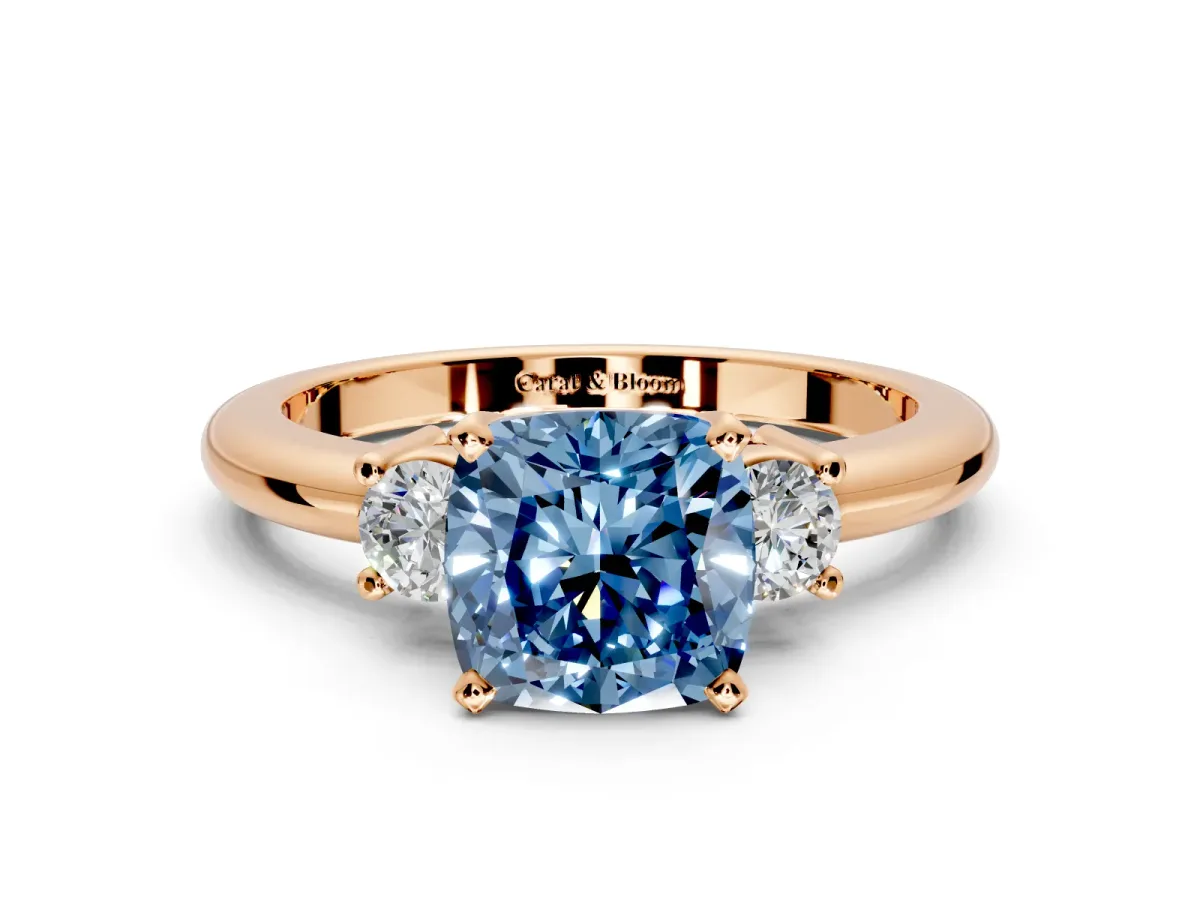 3 Stone Engagement Ring Setting for Fancy Blue Cushion Cut Center with Wide Plain Band and Prong Head in Rose Gold