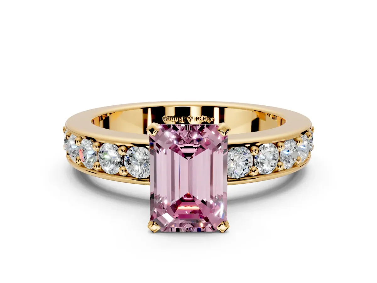 Solitaire Engagement Ring Setting for Fancy Pink Emerald Cut Center with Channel-Set Accents and Prong Head in Yellow Gold