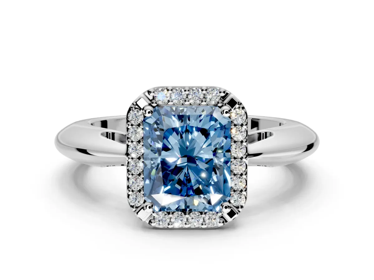 Halo Engagement Ring Setting for Fancy Blue Radiant Cut Center with Tapered Plain Band and Prong Head in White Gold
