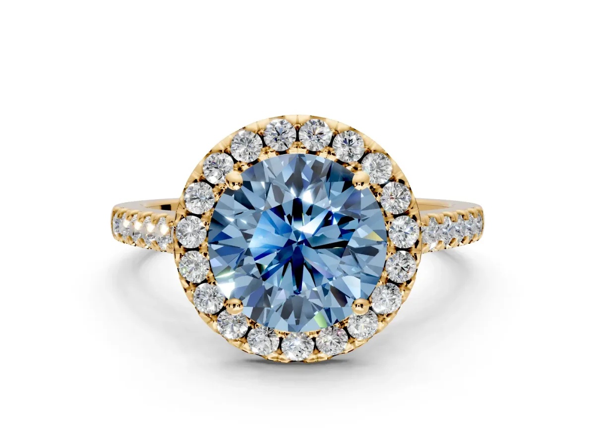 Halo Engagement Ring Setting for Fancy Blue Round Cut Center with Narrowing Pave Band and Prong Head in Yellow Gold