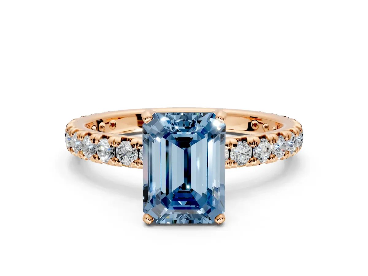 Solitaire Engagement Ring Setting for Fancy Blue Emerald Cut Center with Shared-Prong Accents and Prong Head in Rose Gold