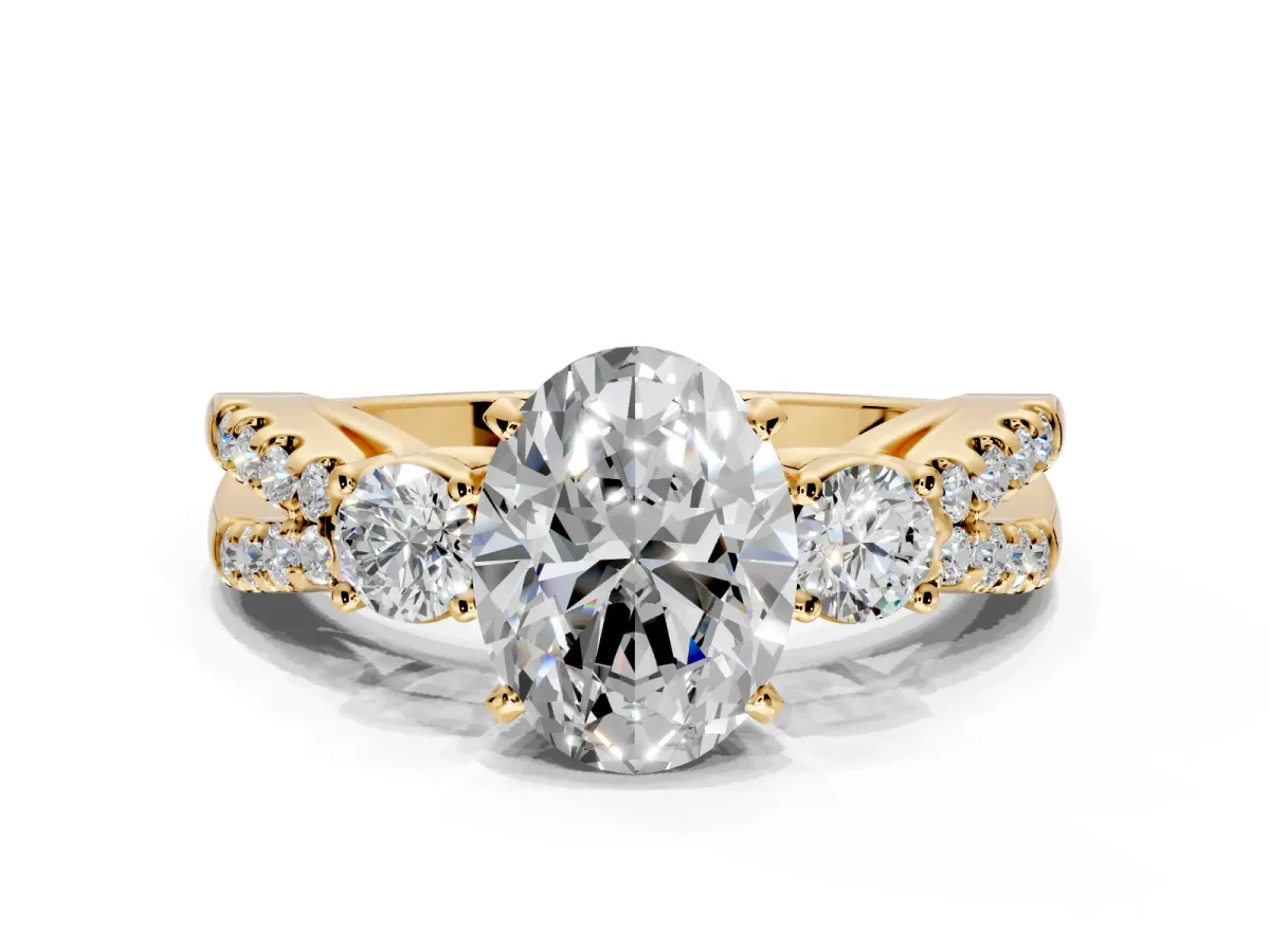 3 Stone Engagement Ring Setting for Oval Center with Pave Split Shank and Prong Head in Yellow Gold