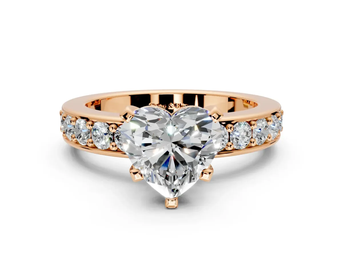 Solitaire Engagement Ring Setting for Heart-Shaped Center with Channel-Set Accents and Prong Head in Rose Gold