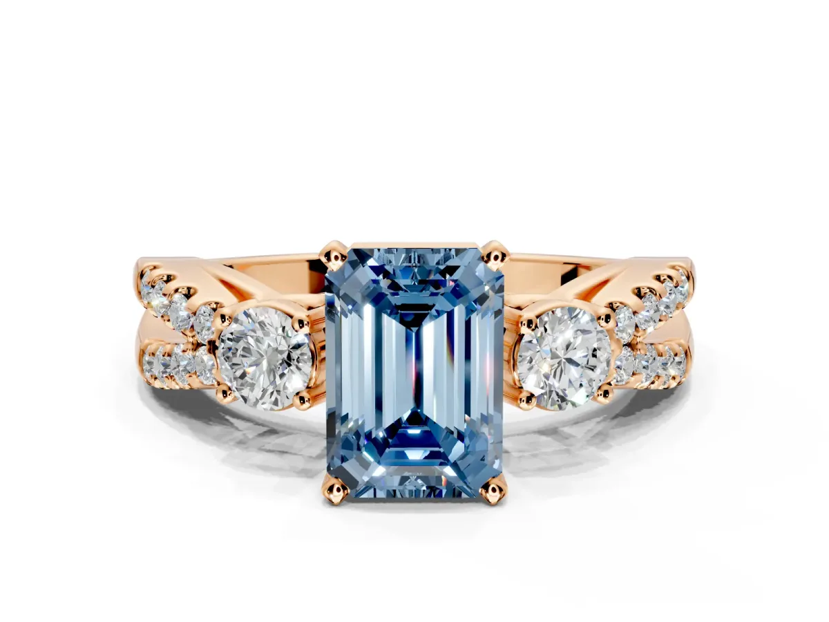 3 Stone Engagement Ring Setting for Fancy Blue Emerald Cut Center with Pave Split Shank and Prong Head in Rose Gold