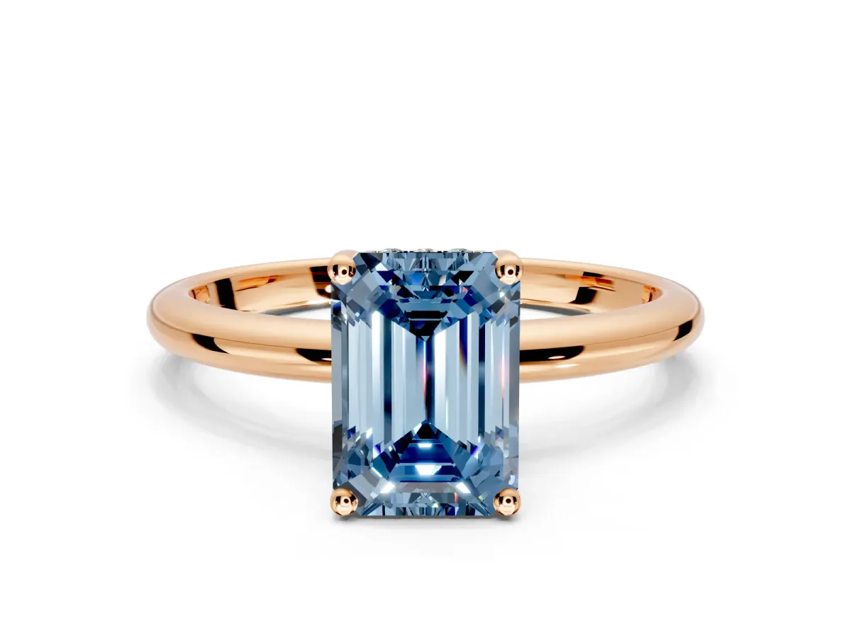 Hidden Halo Engagement Ring Setting for Fancy Blue Emerald Cut Center with Thin Round-Wire Band and Prong Head in Rose Gold