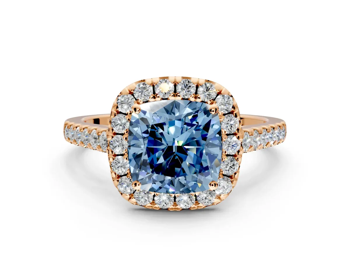 Halo Engagement Ring Setting for Fancy Blue Cushion Cut Center with Narrowing Pave Band and Prong Head in Rose Gold