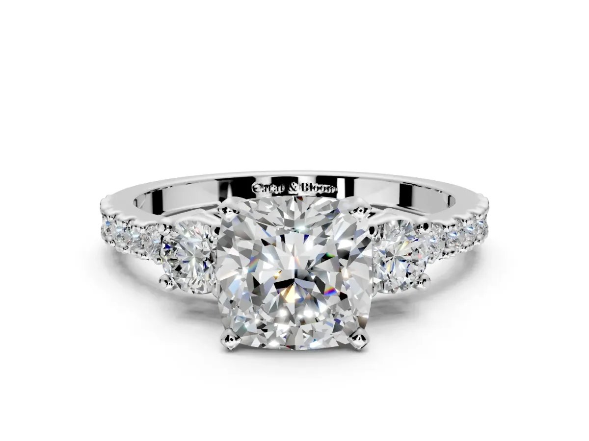 3 Stone Engagement Ring Setting for Cushion Cut Center with Round Cut Side Accents and Prong Head in Platinum