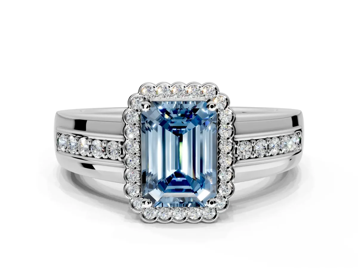 Halo Engagement Ring Setting for Fancy Blue Emerald Cut Center with Wide Band, Inlaid Accent Row and Prong Head in Platinum
