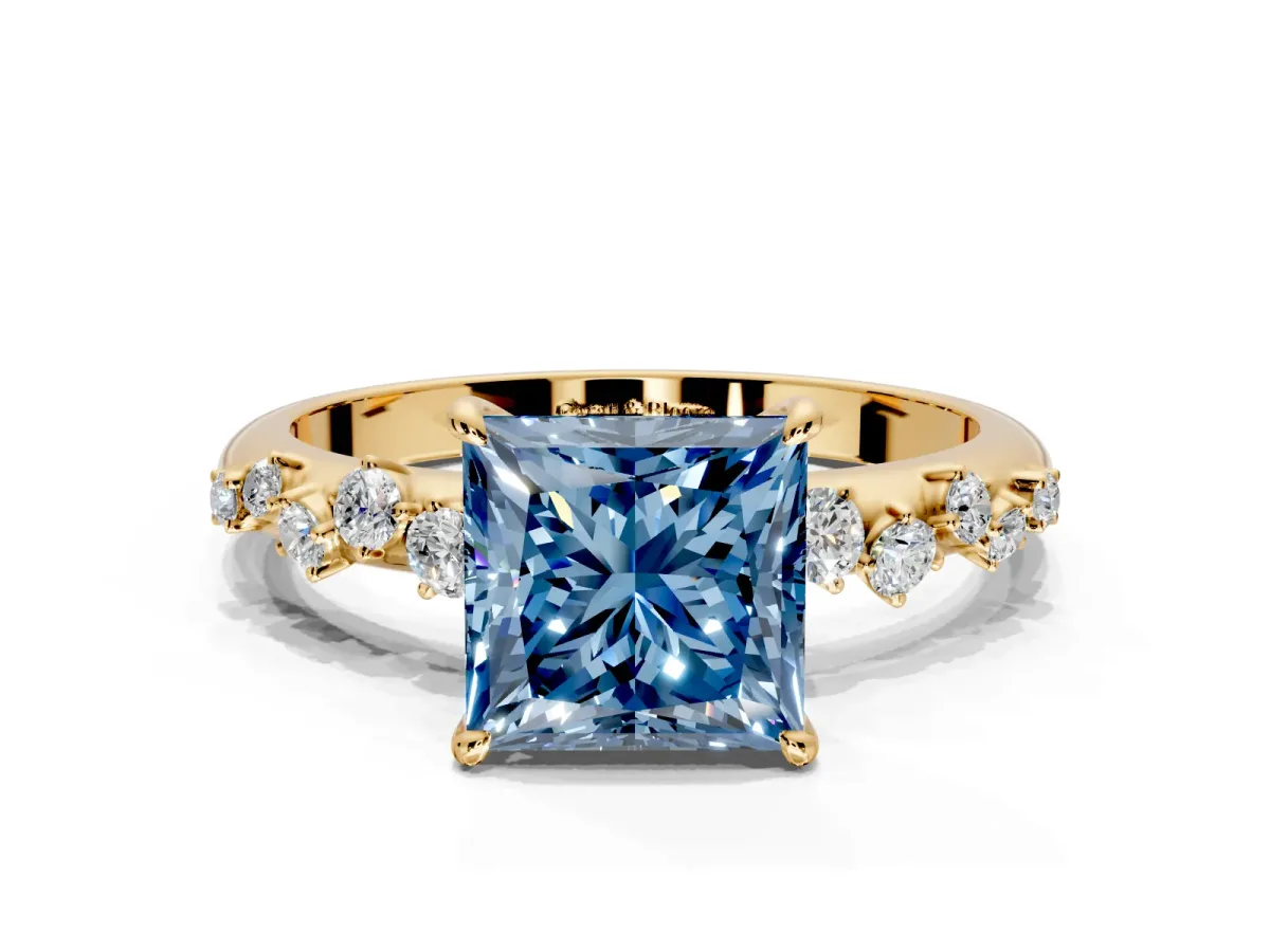 Cluster Engagement Ring Setting for Fancy Blue Princess Cut Center with Round Cut Accent Band and Prong Head in Yellow Gold