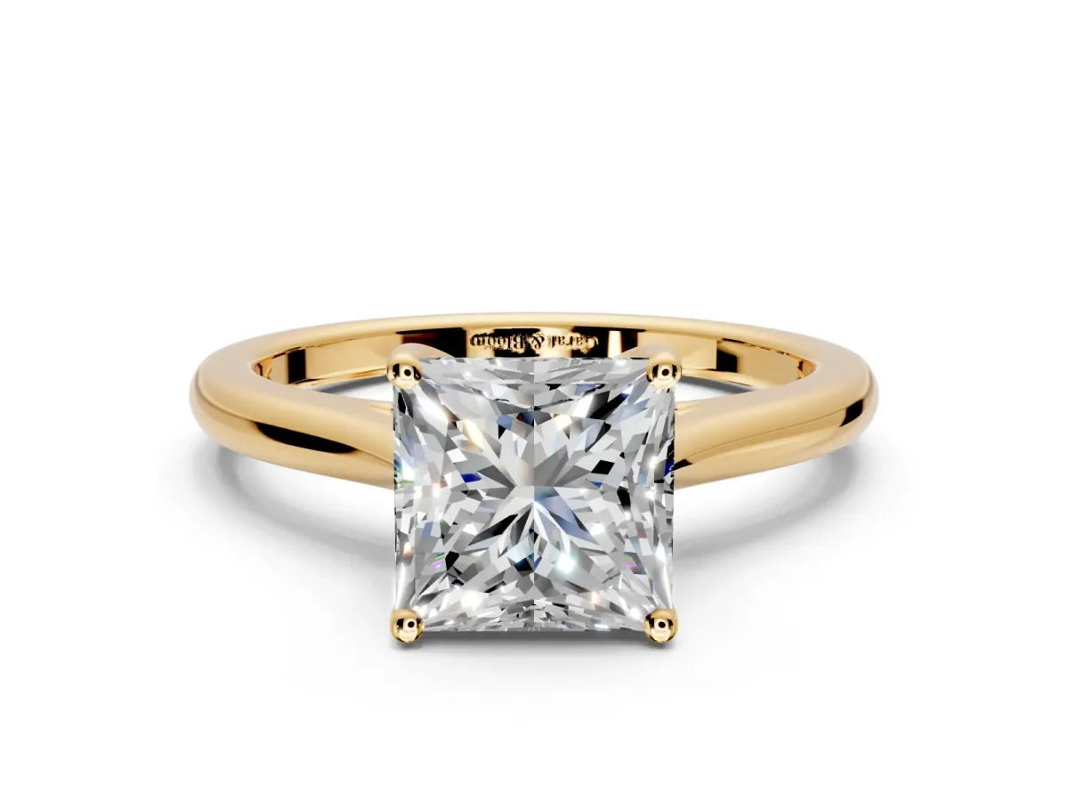 Solitaire Engagement Ring Setting for Princess Cut Center with Narrow Cathedral Band and Prong Head in Yellow Gold