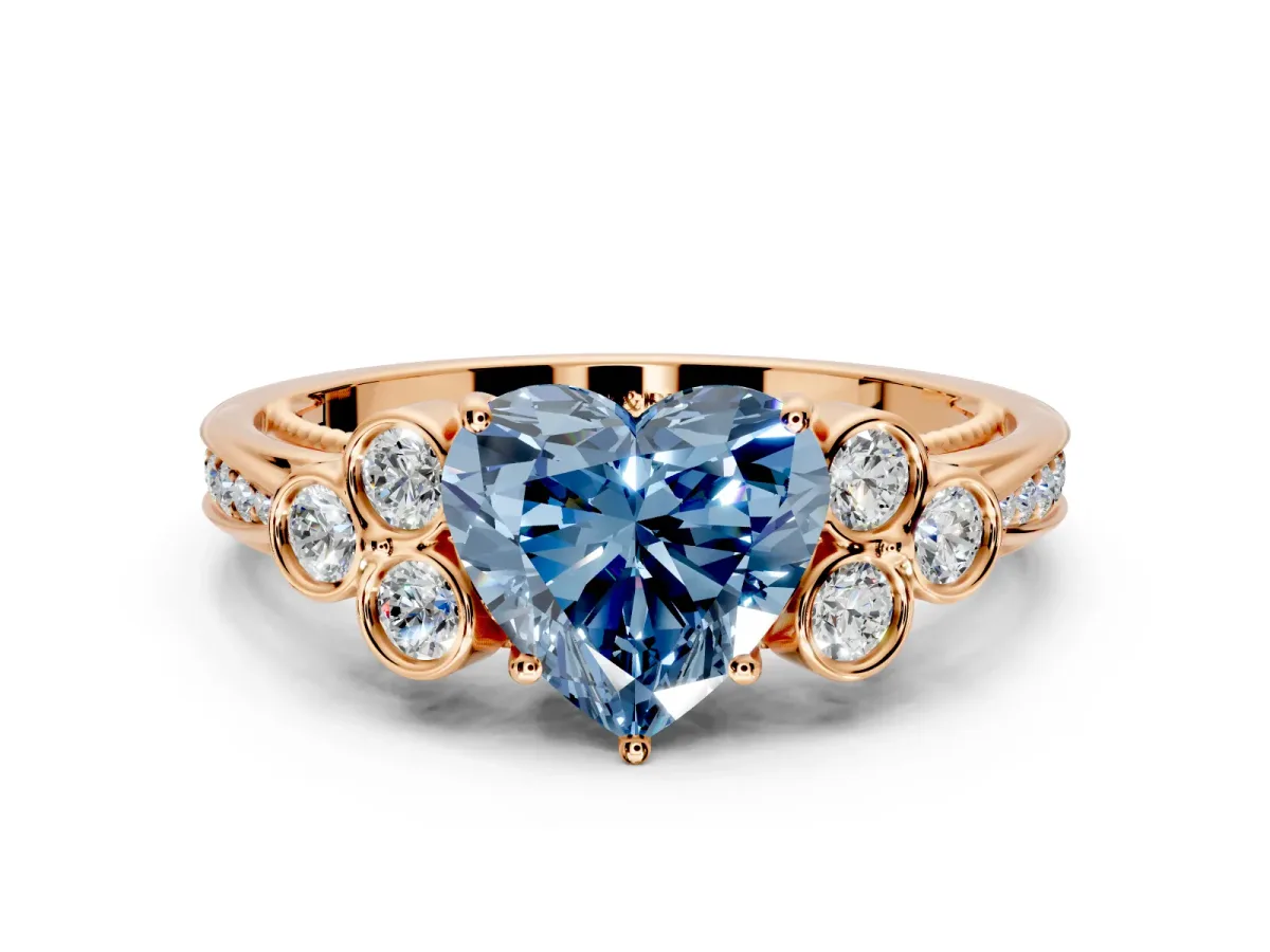 Cluster Engagement Ring Setting for Fancy Blue Heart-Shaped Center with Bezel Accent Clusters and Prong Head in Rose Gold