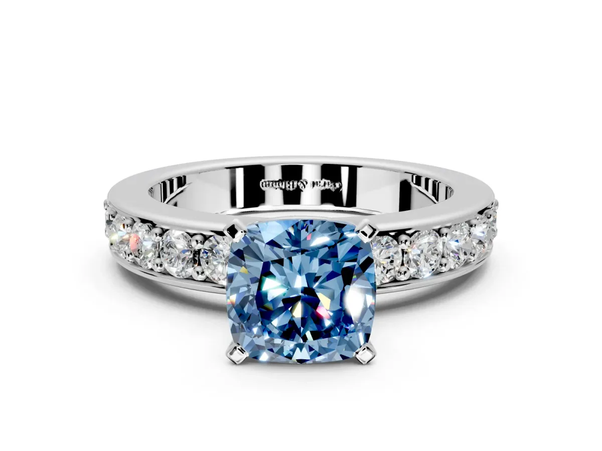 Solitaire Engagement Ring Setting for Fancy Blue Cushion Cut Center with Channel-Set Accents and Prong Head in Platinum