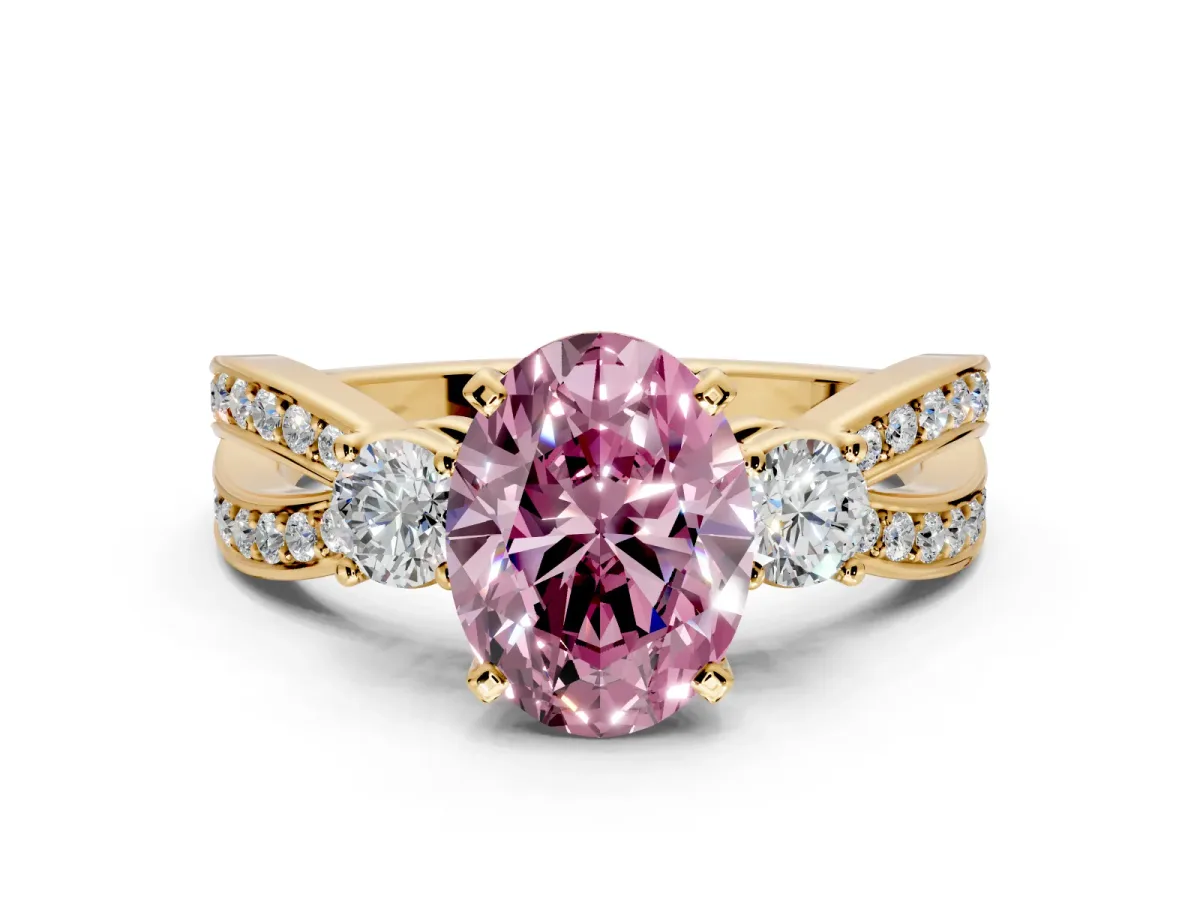 3 Stone Engagement Ring Setting for Fancy Pink Oval Center with Pave Twist Band and Prong Head in Yellow Gold