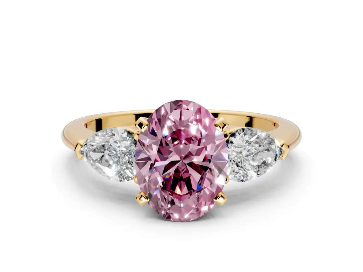 3 Stone Engagement Ring Setting for Fancy Pink Oval Center with Large Pear-Shaped Accents and Prong Head in Yellow Gold