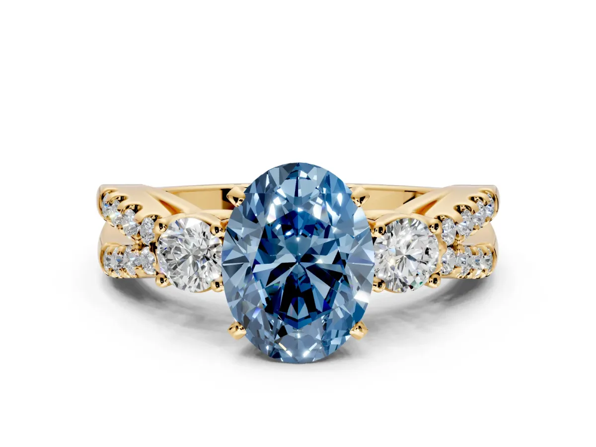 3 Stone Engagement Ring Setting for Fancy Blue Oval Center with Pave Split Shank and Prong Head in Yellow Gold
