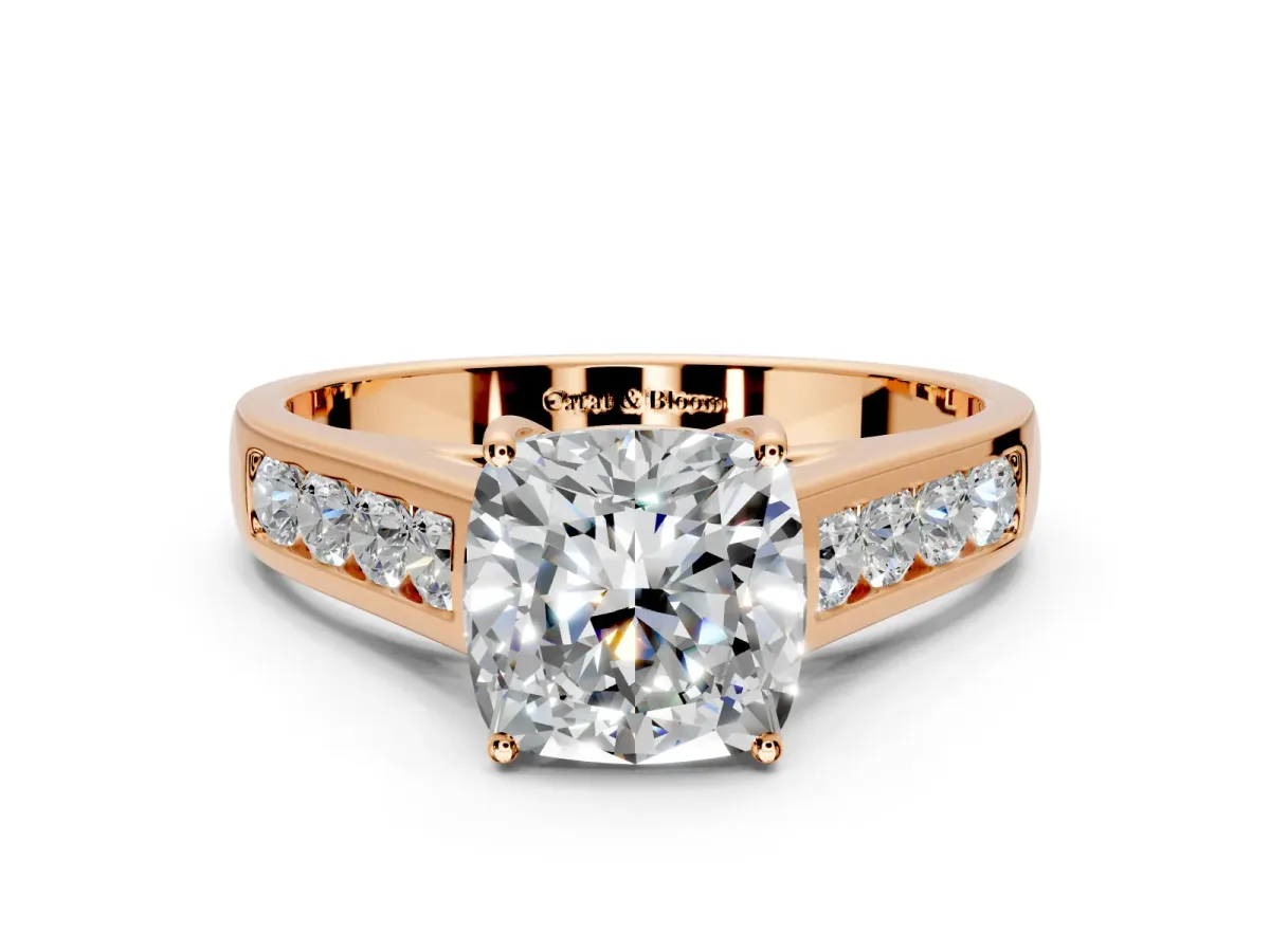 Solitaire Engagement Ring Setting for Cushion Cut Center with Round Cut Channel Band and Prong Head in Rose Gold