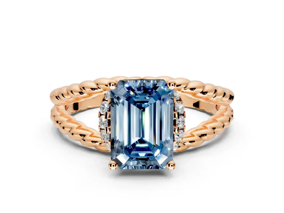 Halo Engagement Ring Setting for Fancy Blue Emerald Cut Center with Rope Twist Split Shank and Prong Head in Rose Gold