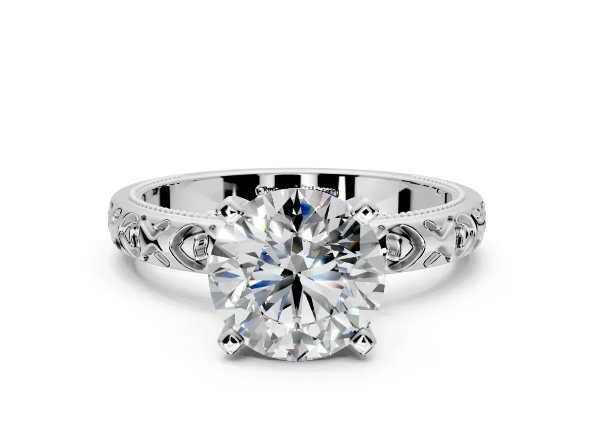 Solitaire Engagement Ring Setting for Round Cut Center with XO Engraved Band and Prong Head in Platinum
