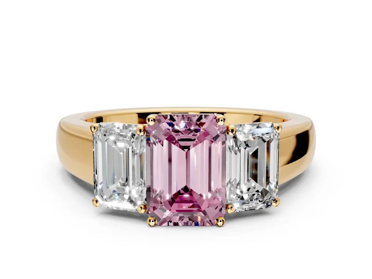 3 Stone Engagement Ring Setting for Fancy Pink Emerald Cut Center with Raised Basket Heads and Prong Head in Yellow Gold