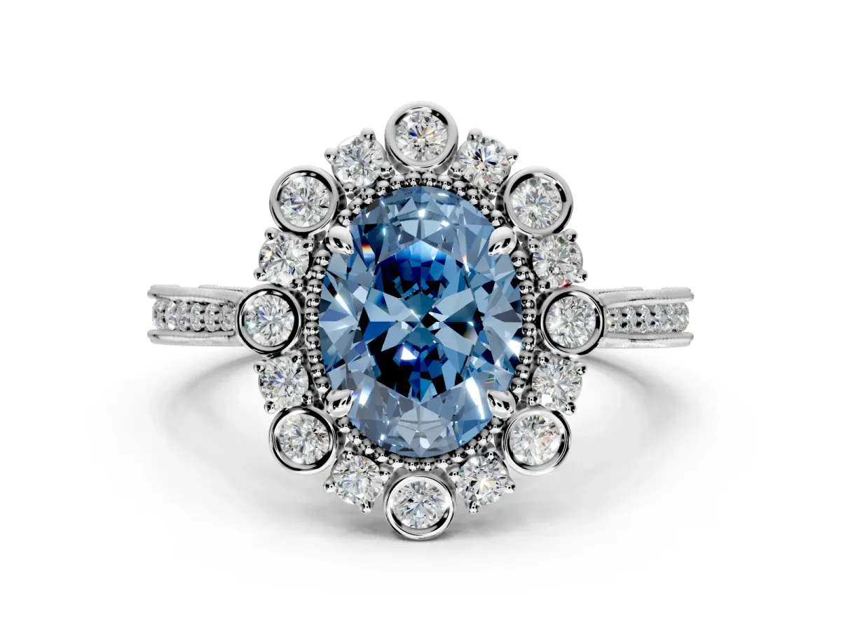 Milgrain Halo Engagement Ring Setting for Fancy Blue Oval Center with Bezel Point Accents and Prong Head in Platinum