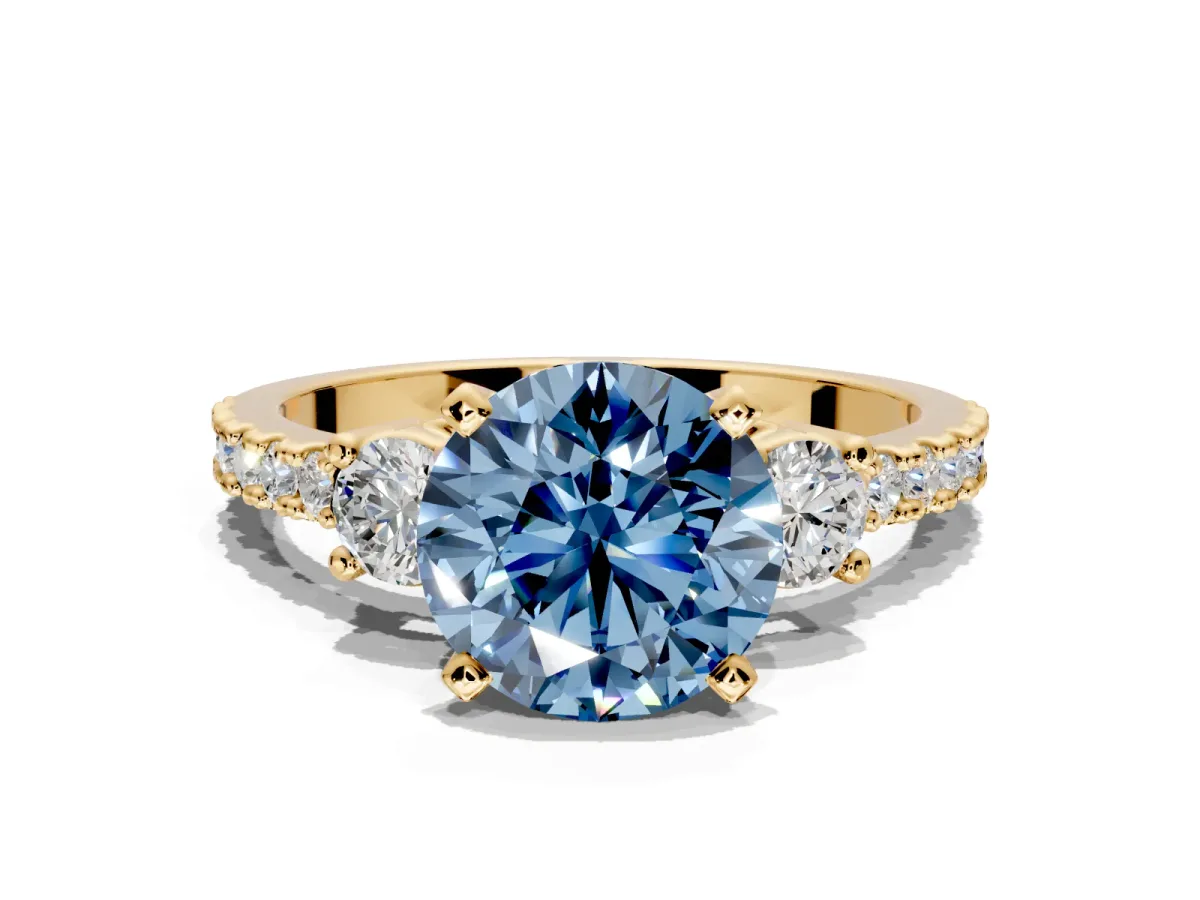 3 Stone Engagement Ring Setting for Fancy Blue Round Cut Center with Round Cut Side Accents and Prong Head in Yellow Gold