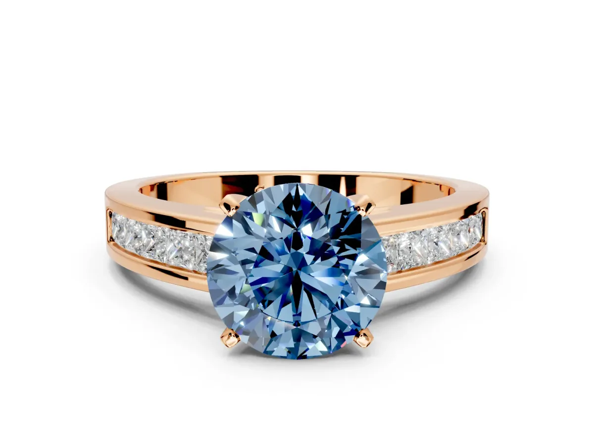 Solitaire Engagement Ring Setting for Fancy Blue Round Cut Center with Princess Cut Channel Band and Prong Head in Rose Gold