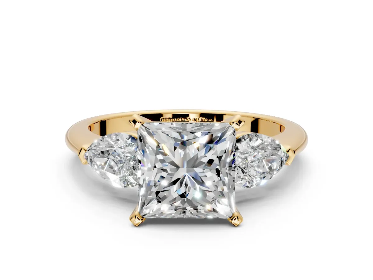 3 Stone Engagement Ring Setting for Princess Cut Center with Large Pear-Shaped Accents and Prong Head in Yellow Gold