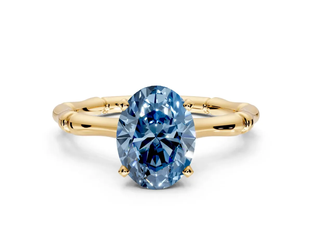 Solitaire Engagement Ring Setting for Fancy Blue Oval Center with Bamboo Band and Prong Head in Yellow Gold