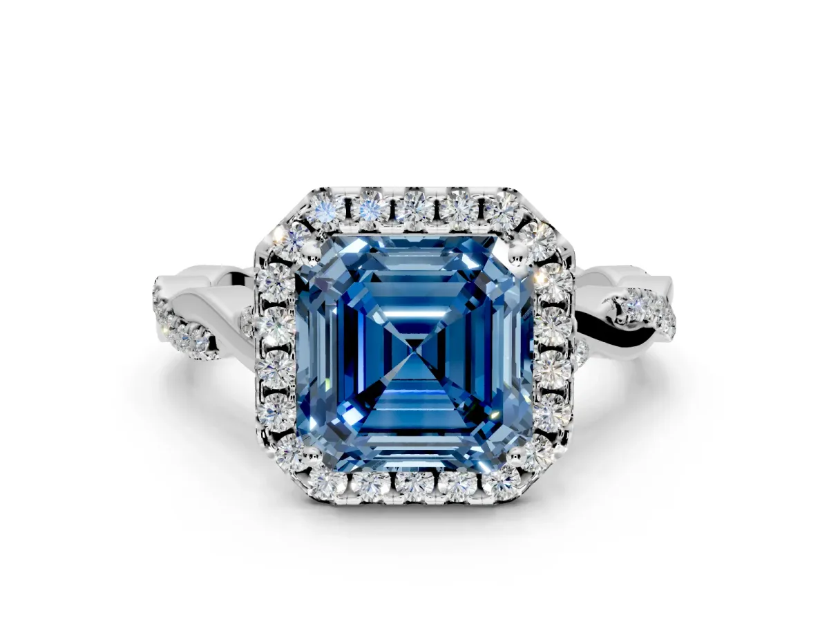 Halo Engagement Ring Setting for Fancy Blue Asscher Cut Center with Twist Band and Prong Head in White Gold