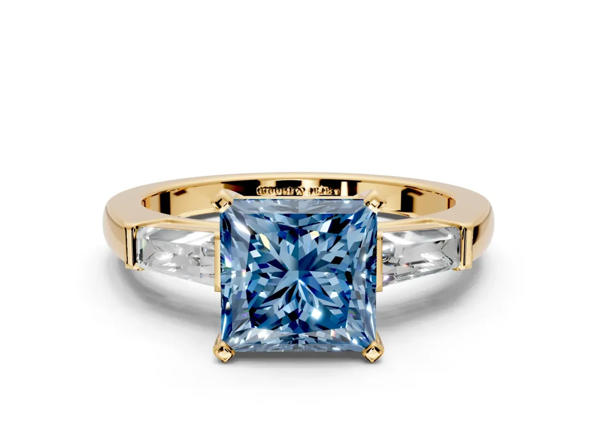 3 Stone Engagement Ring Setting for Fancy Blue Princess Cut Center with Tapered Baguettes, Plain Band and Prong Head in Yellow Gold