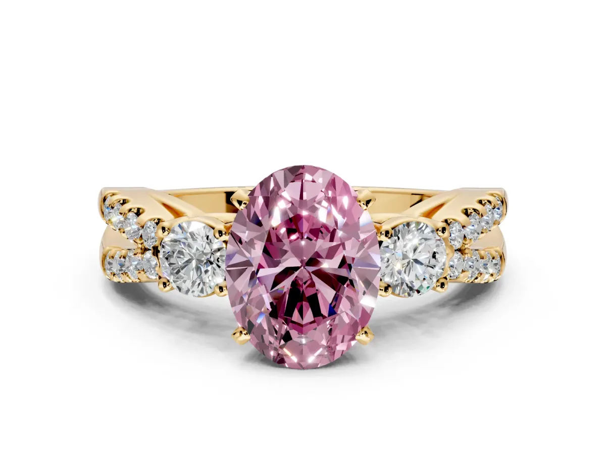 3 Stone Engagement Ring Setting for Fancy Pink Oval Center with Pave Split Shank and Prong Head in Yellow Gold